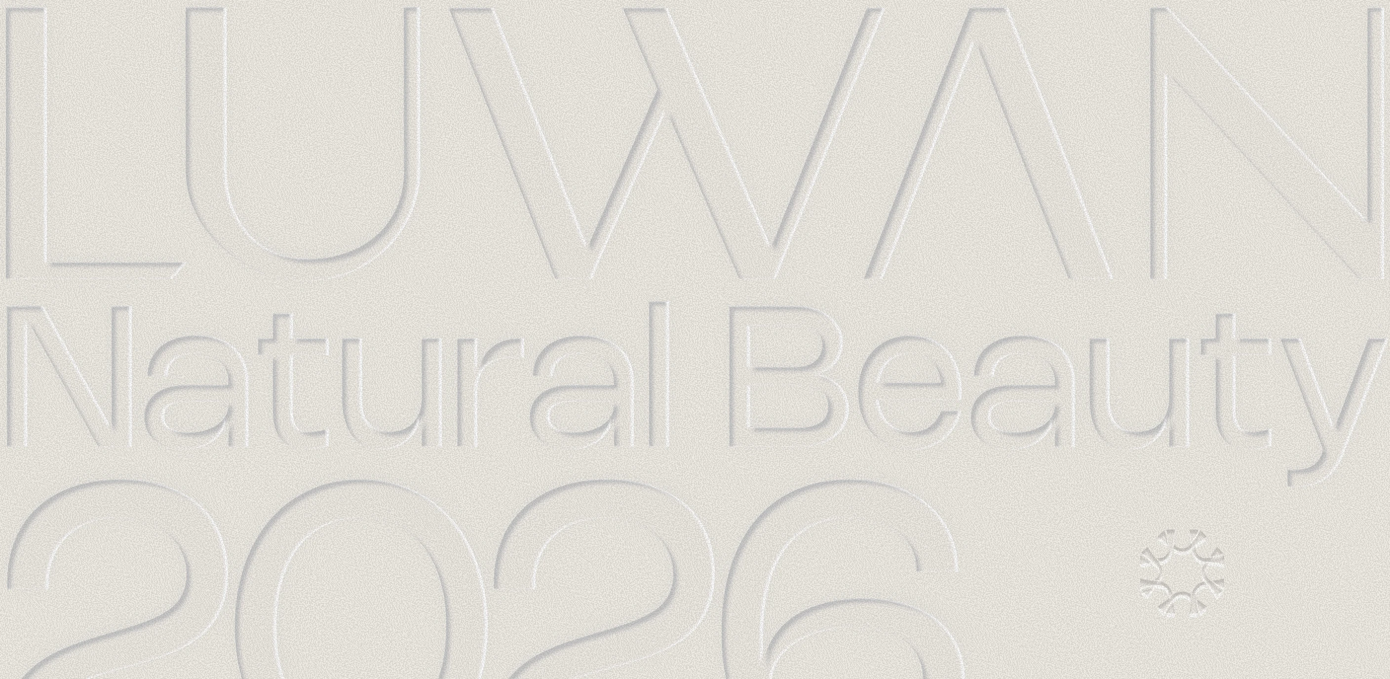 LUWAN embossed wordmark — Natural Beauty 2026