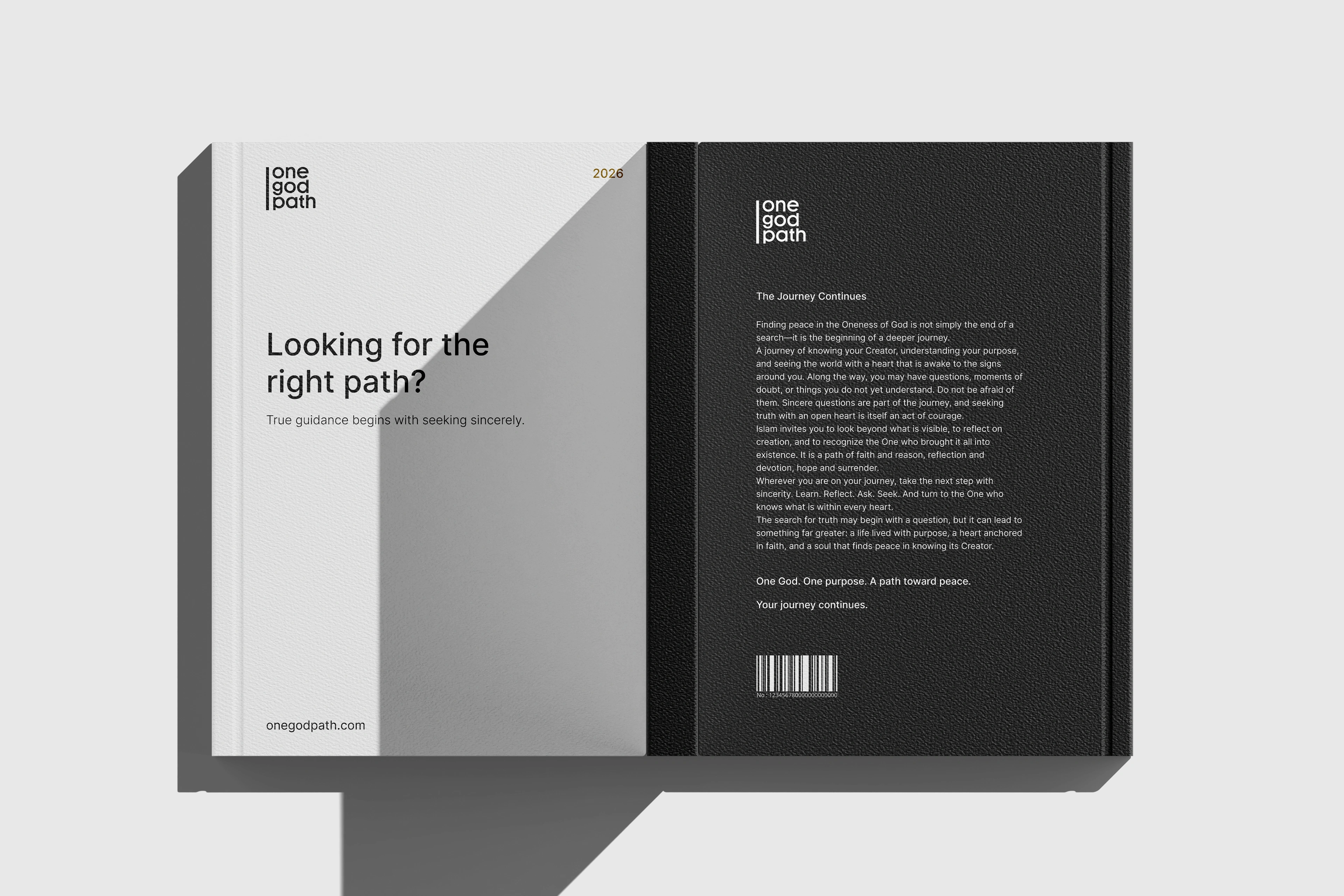 An open book lies flat on light grey, showing the pale front cover and the dark back cover with body copy and a barcode.
