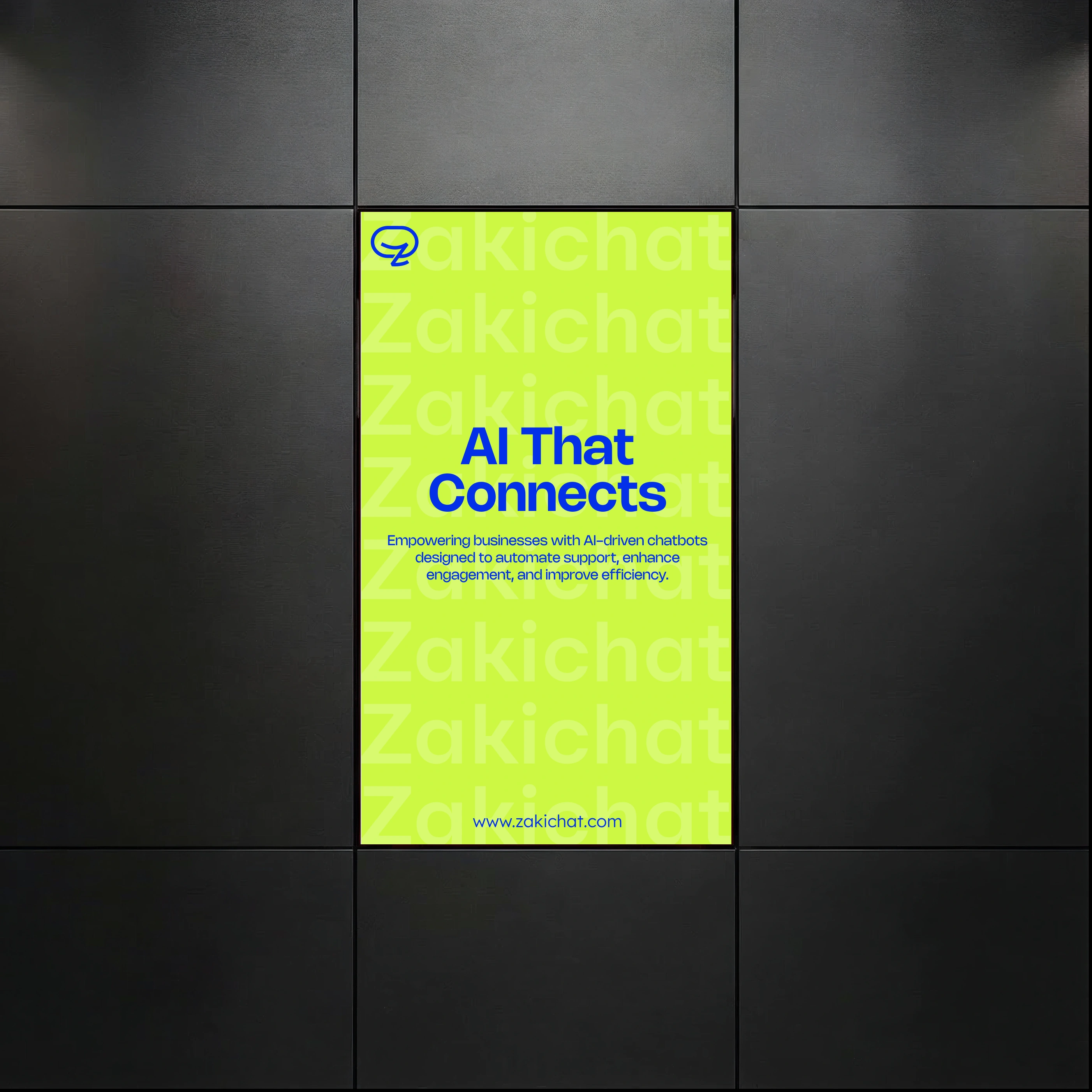 A tall lit digital signage screen on a dark panelled wall running a fluorescent-yellow poster that reads AI That Connects in blue over a repeating ghosted Zakichat pattern, with body copy and www.zakichat.com beneath.